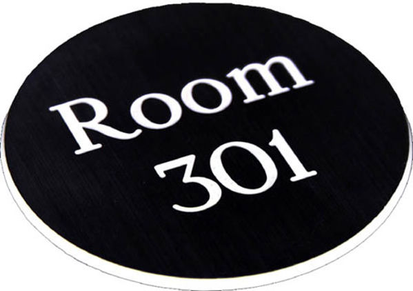 Picture of Engraved Sign with adhesive backing - 95mm dia White text on black