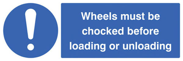 Picture of Wheels must be chocked before loading or unloading