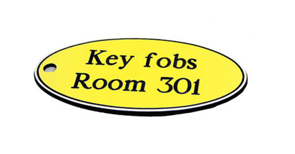 Picture of 78x150mm Key fob oval - Black text on yellow
