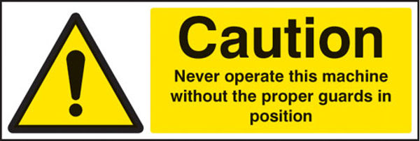 Picture of Caution never operate machine without proper guards
