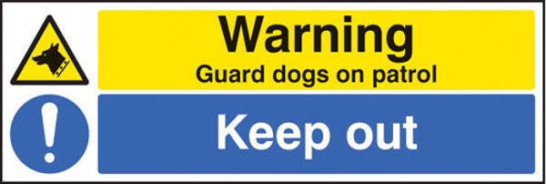 Picture of Warning guard dogs on patrol keep out