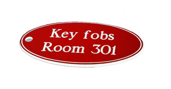 Picture of 50x100mm Key fob oval - White text on red