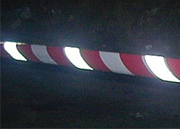 Picture of Red & white non-adhesive reflective barrier tape 75mm x 250m