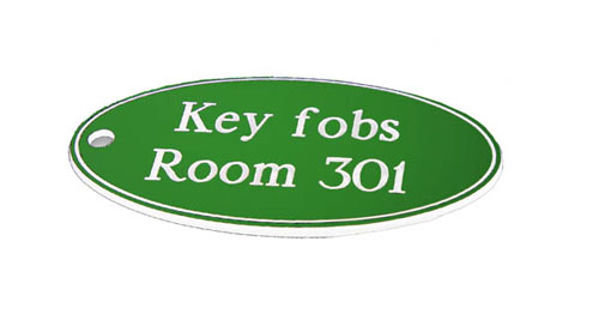 Picture of 50x100mm Key fob oval - White text on green
