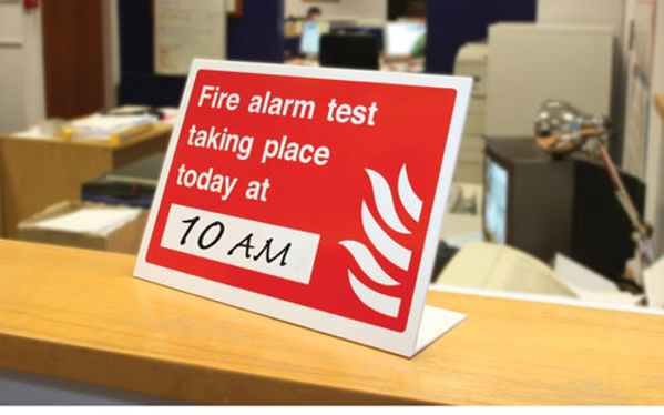 Picture of Fire alarm test taking place today at (insert time) table top sign